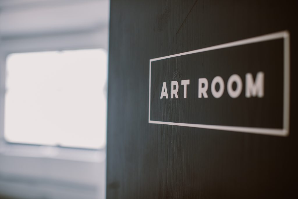 An art room sign in black and white
