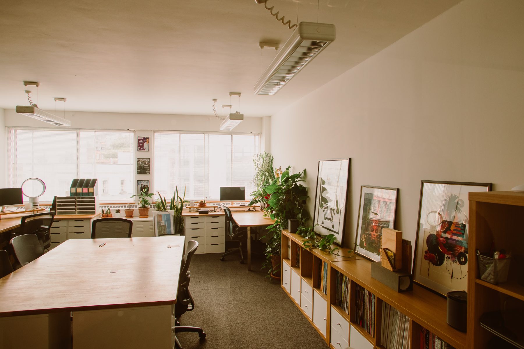 An office space with mid century style furniture